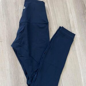 Brand new, no tags. Lululemon navy leggings. Size 0.